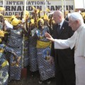Pope Benedict XVI is welcomed upon arrival during a ceremony at Cotonou’s international airport in Benin, Friday, Nov. 18, 2011.