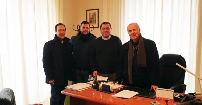 don Angelo Milone,un rappresentante dell'impresa,don Roberto- Fucile,monsignor Agostino Russo